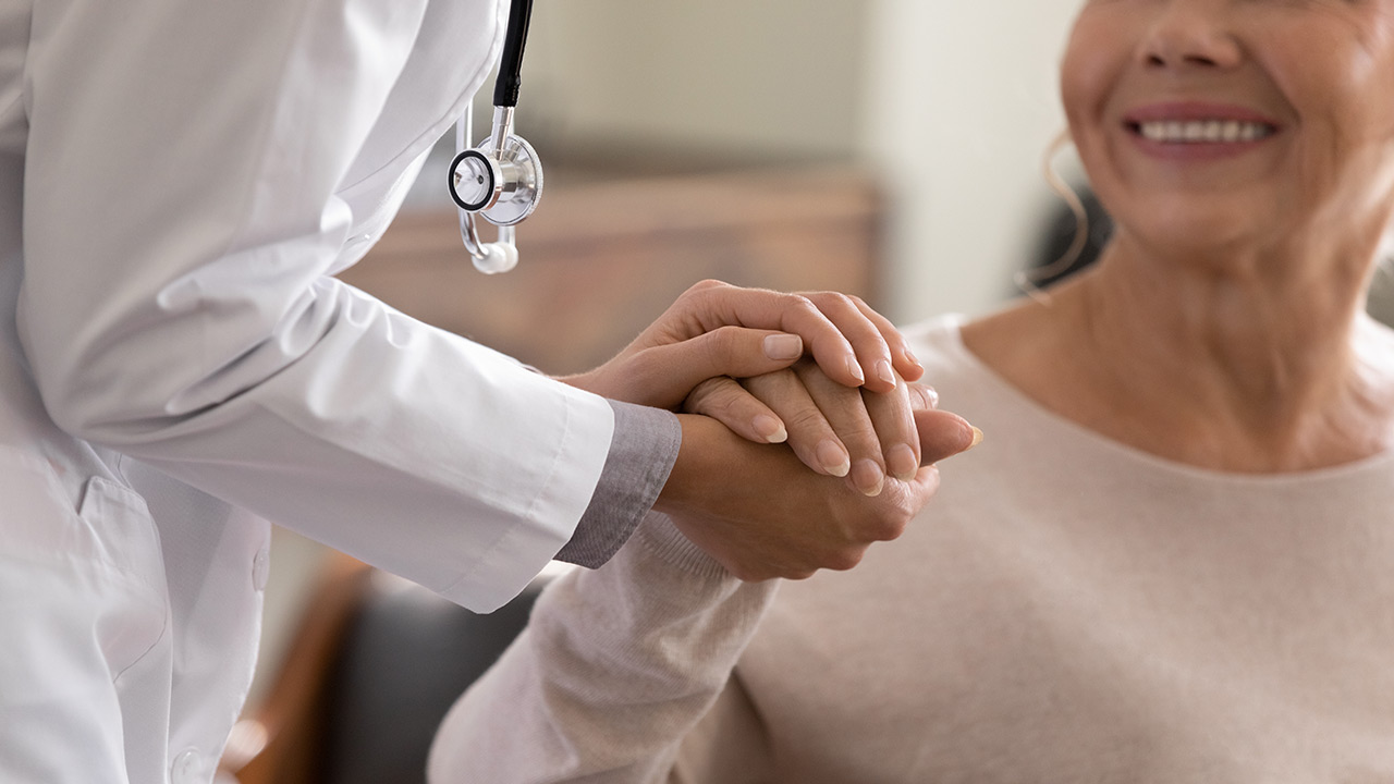 elderly woman with doctor