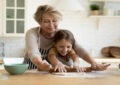 grandmother grandchild baking together