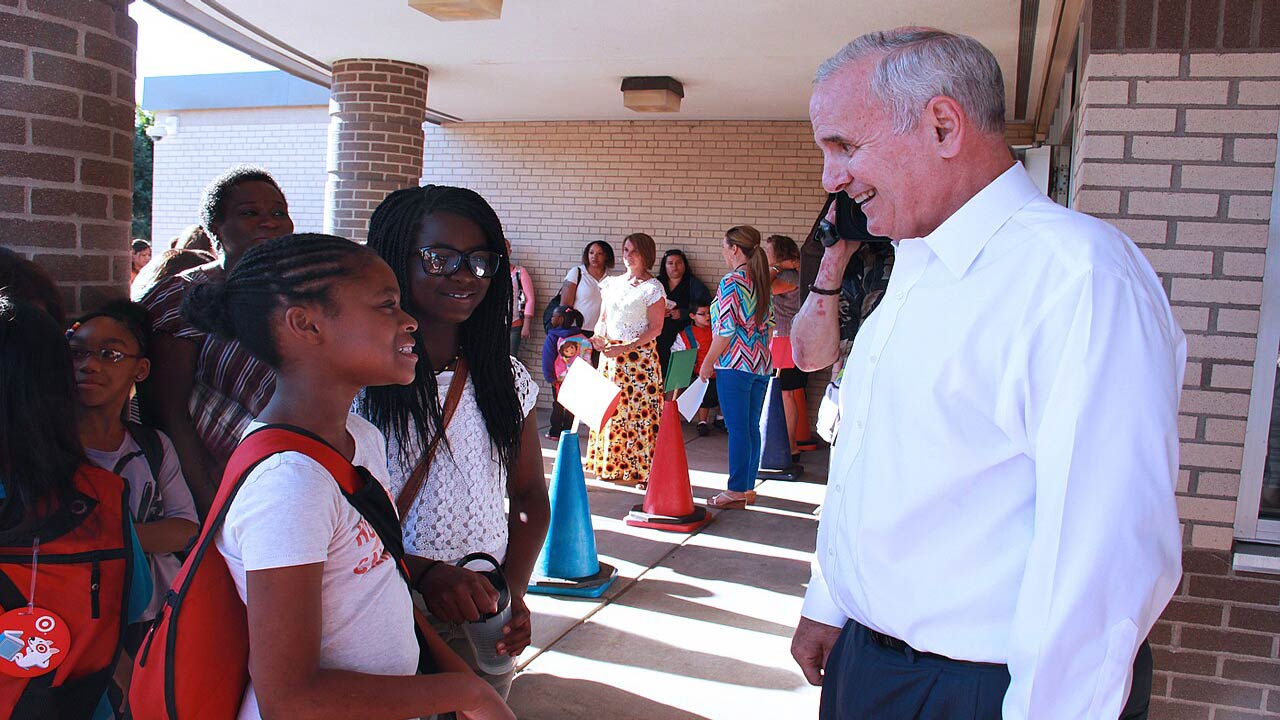 kids being greeted on first day of school