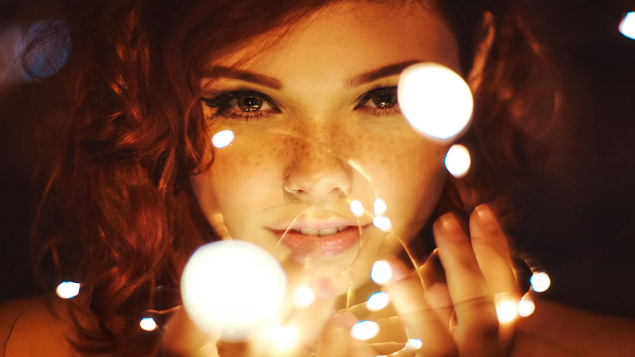 girl with fairy lights