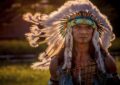 native american man in traditional headdress