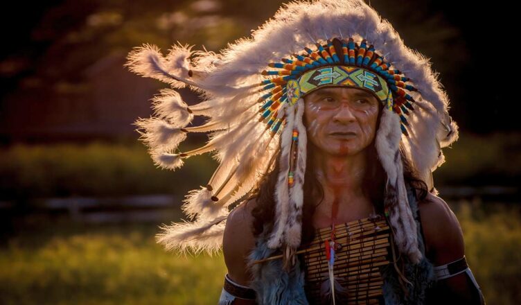 native american man in traditional headdress