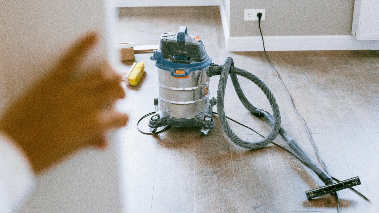 vacuum cleaner in empty room